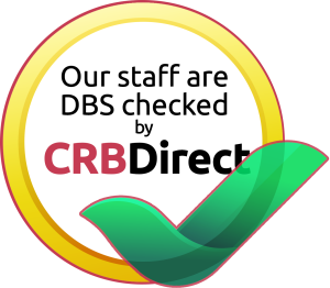 Badge stating staff are DBS checked by CRB Direct, with yellow ring and green checkmark icon.